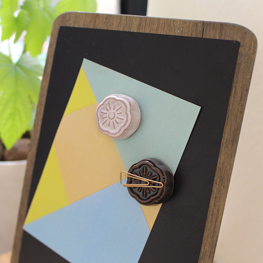 Cohana ceramic needle rests holding paper on magnetic board