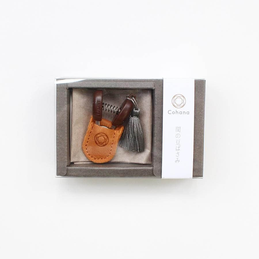 Boxed mini sewing scissors with grey tassel and leather case