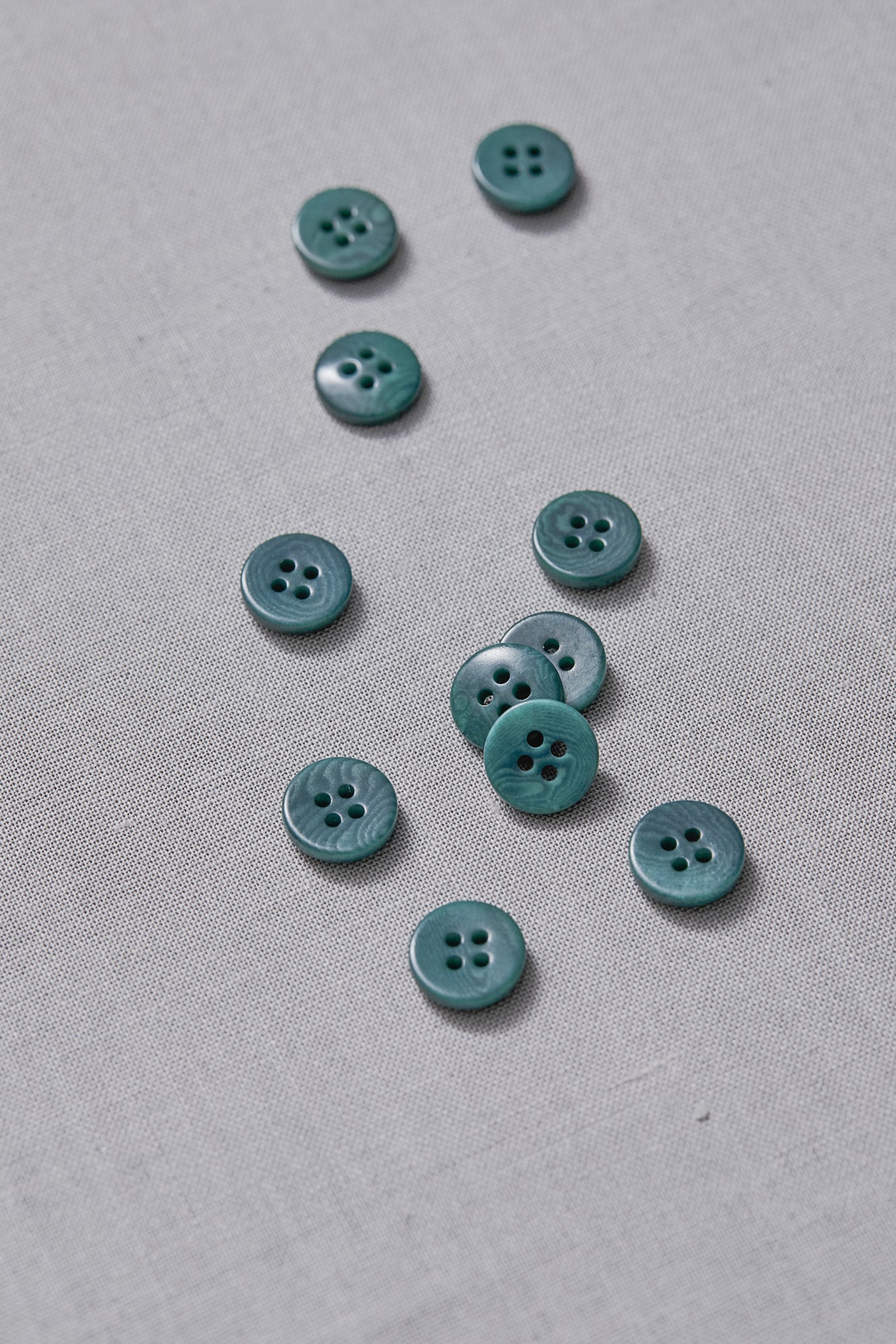 PLAIN 4 HOLE COROZO BUTTON | Aqua 11mm