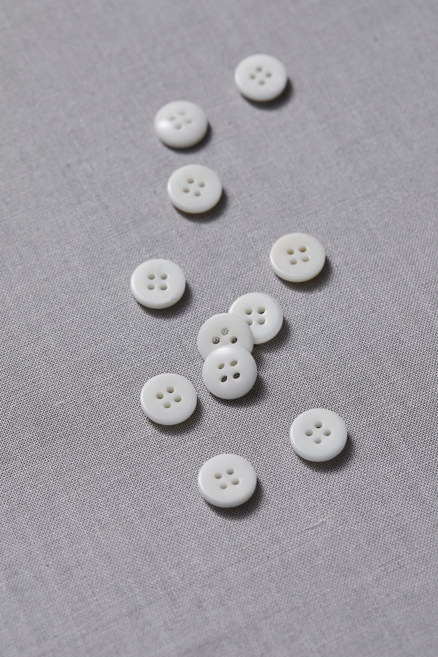 PLAIN 4 HOLE COROZO BUTTON | Bright White 11mm