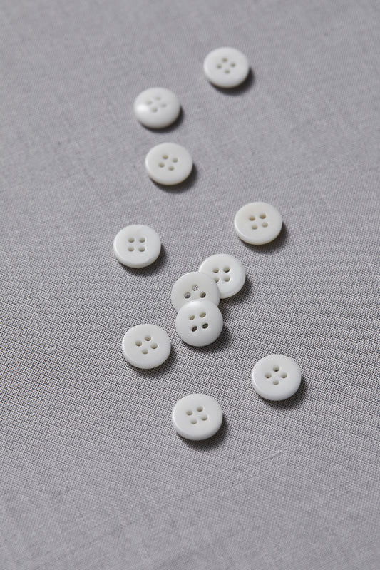 PLAIN 4 HOLE COROZO BUTTON |  Bright White 11mm