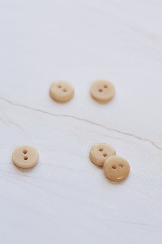 11mm corozo shirt button in colour dune (beige) by mind the maker