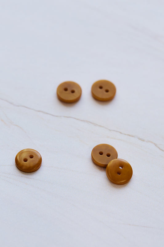 11mm gold corozo shirt button by mind the maker