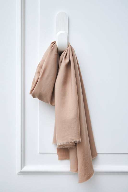 Piece of Vida voile tencel sewing fabric in colour warm sand