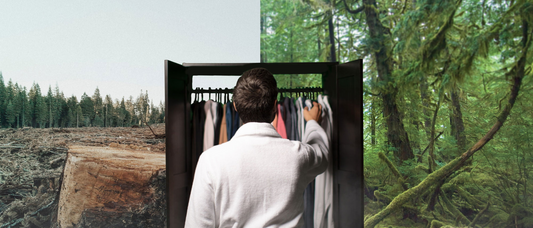 Man picking clothes out of wardrobe against backdrop of forest