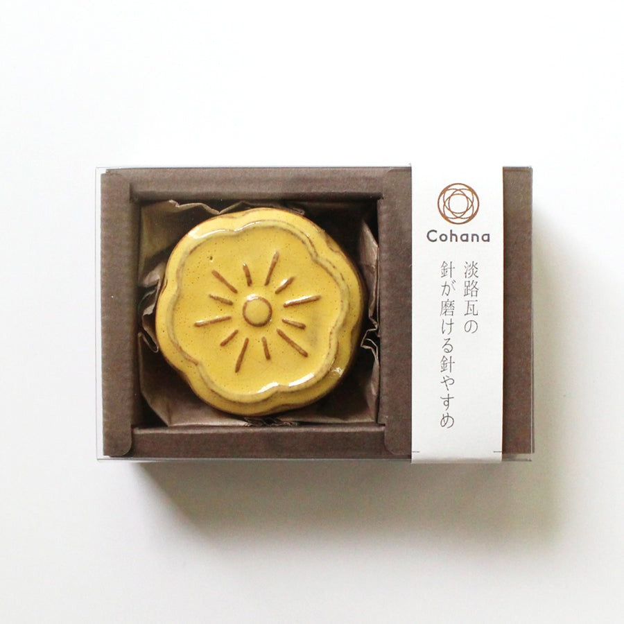 Boxed yellow cohana flower shaped ceramic magnetic needle rest