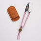 Cohana thread snips with pink silk thread woven handles and leather case