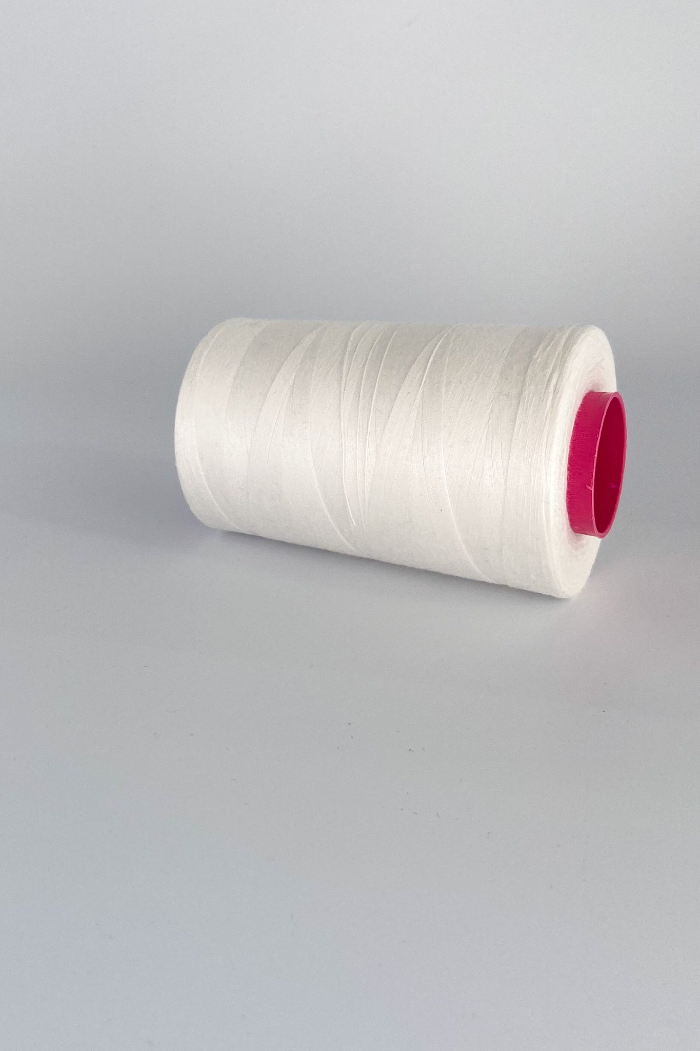 Spool of cellulose, tencel sewing thread in natural