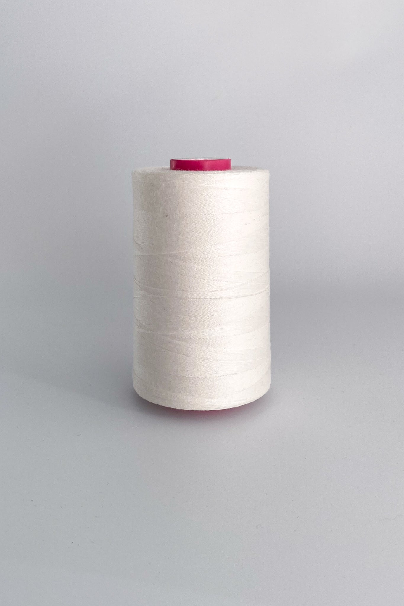 Cone of tencel sewing thread in natural standing up