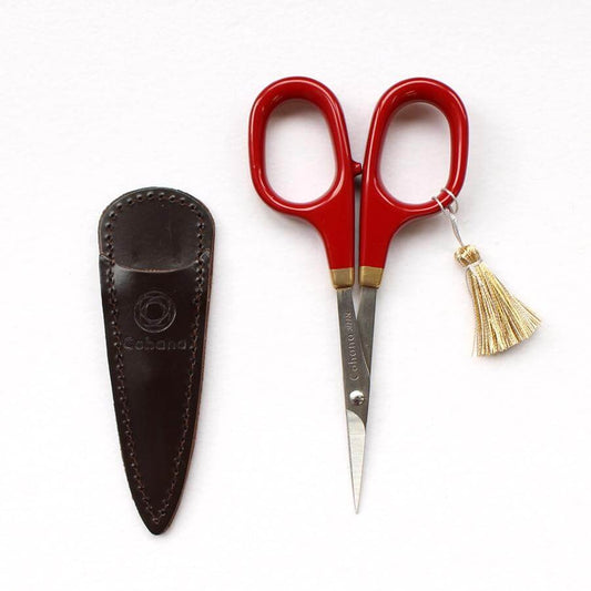 Embroidery scissors with red lacquer handles and leather case