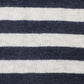 Ultra close up of navy/white stripe hemp and lyocell jersey knit fabric