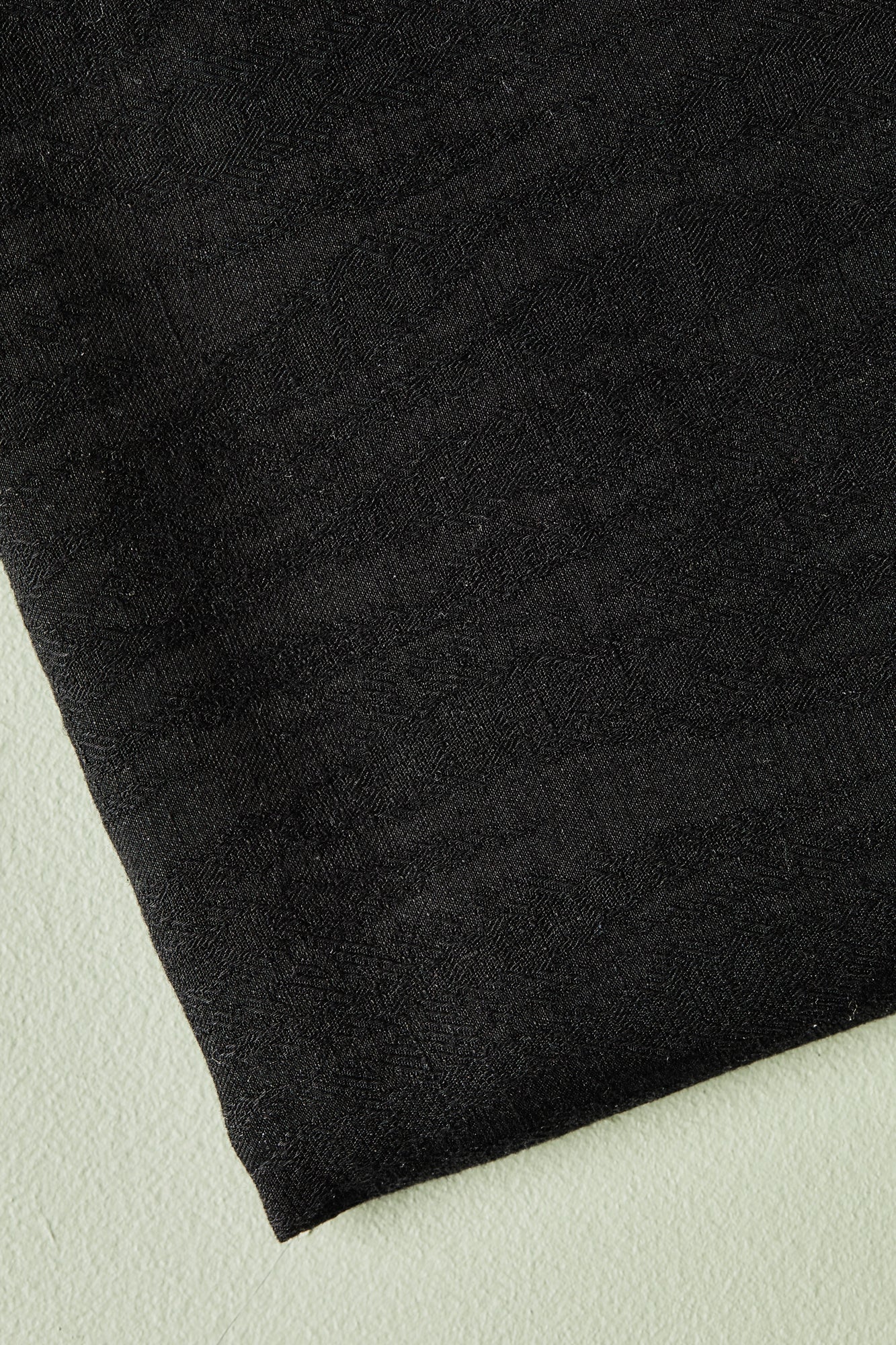 Close up of black Hoya jacquard blend linen sewing fabric