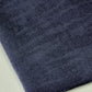 Close up of navy linen and tencel blend sewing fabric