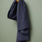 Linen and tencel blend sewing fabric in navy hanging on hook