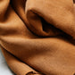 Close up of Mara linen blend tencel sewing fabric in colour mustard