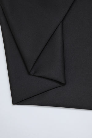 Flat lay of organic cotton twill fabric in colour black