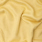 Close up of yellow Ecovero knit sewing fabric