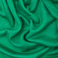 Close up of frog green Ecovero knit sewing fabric