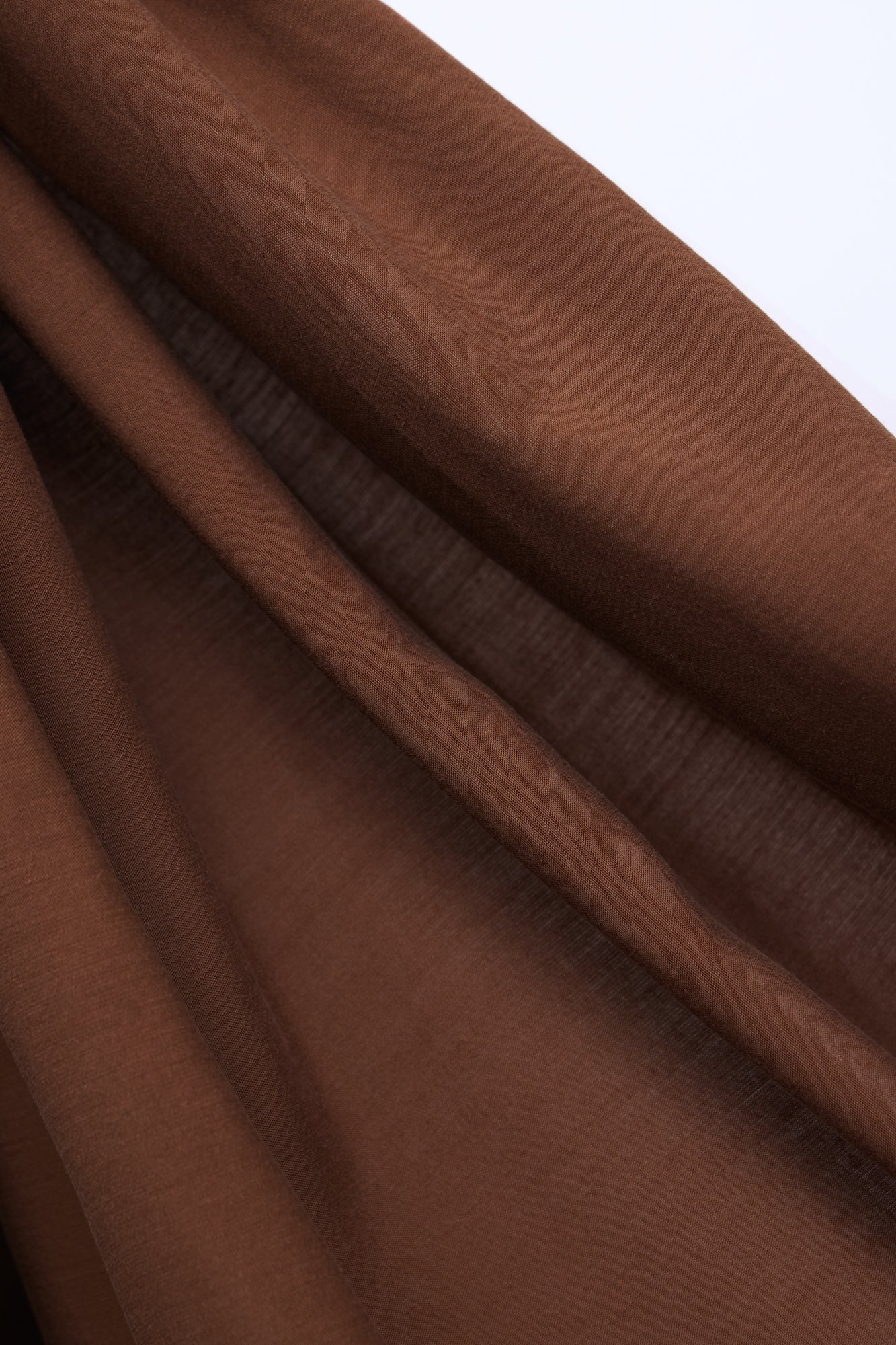 Close up of Vida voile fabric in pecan, brown